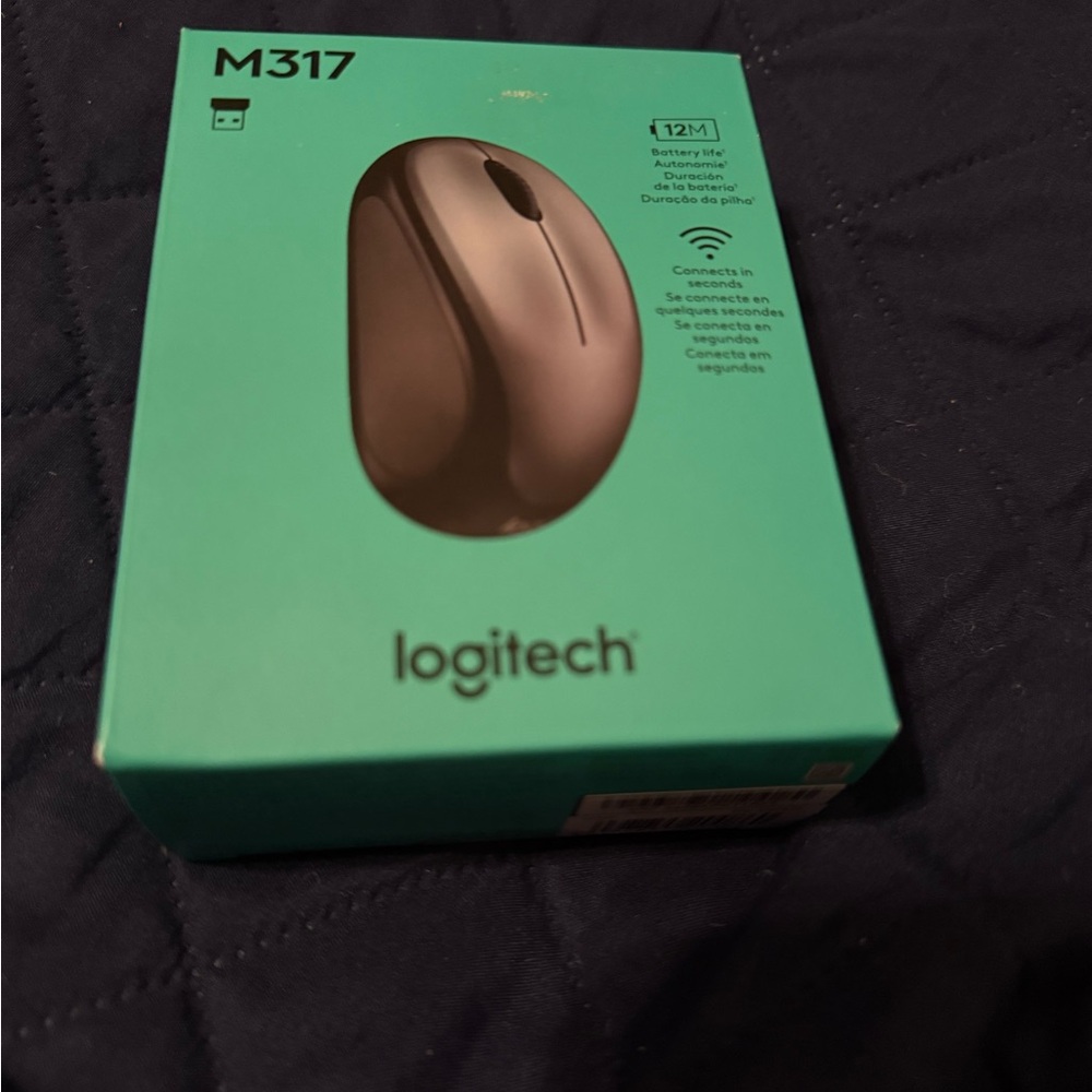 Logitech M317 wireless mouse. New in box